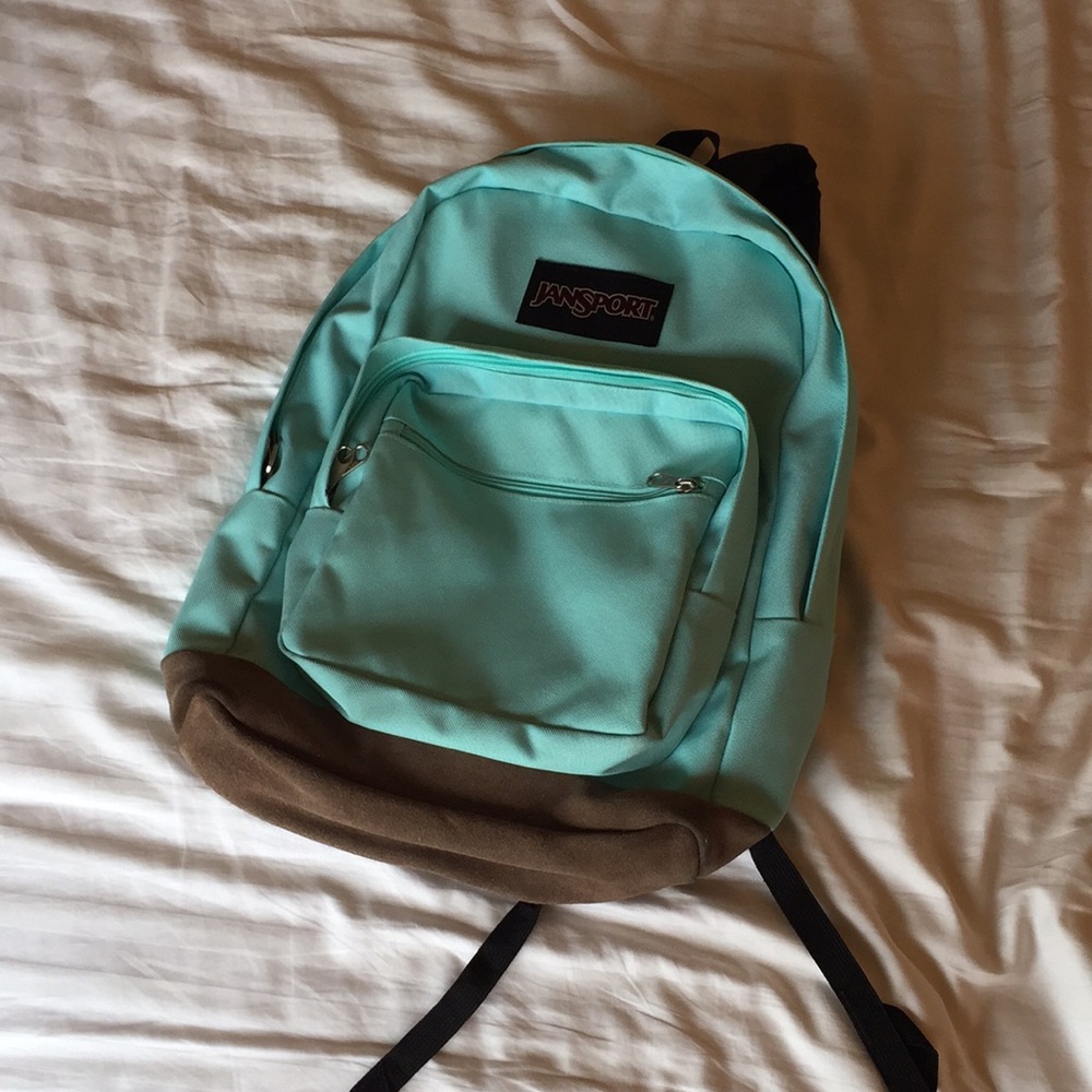 Jansport blue leather backpack